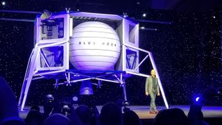 Blue Origin founder Jeff Bezos unveils a mockup of the Blue Moon lunar lander on May 9, 2019.