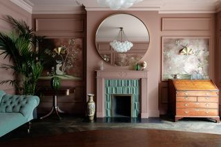 A living room in light pink color