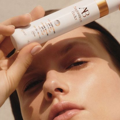 model holding augustinus bader spf