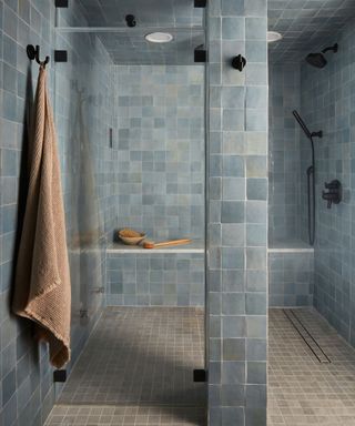 Dusty blue tiled bathroom