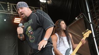 Rob Trujillo and Mike Muir on stage together