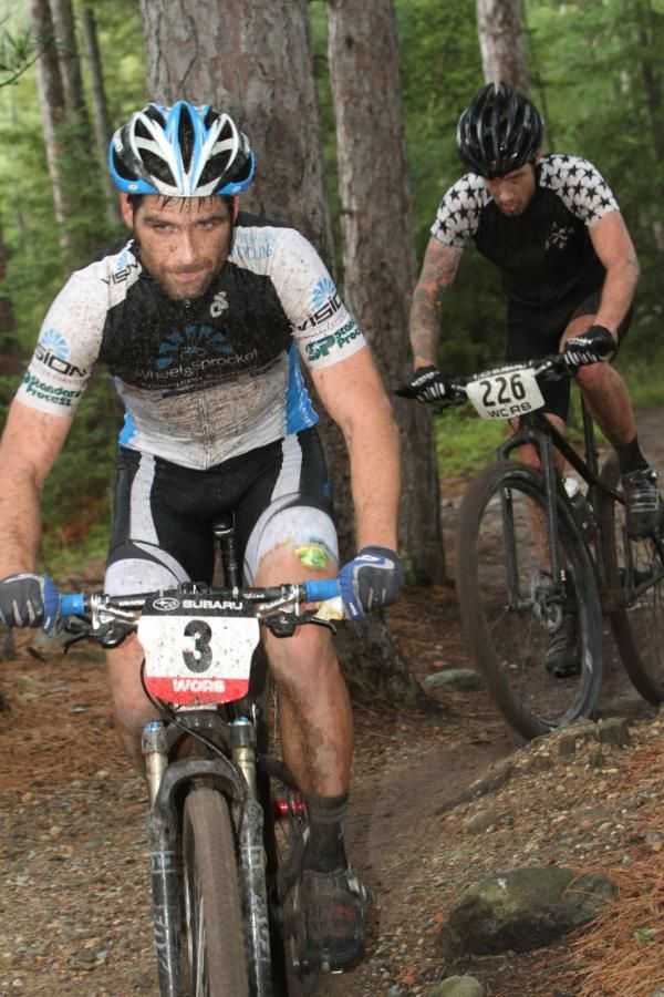 Nathan Guerra (Wheel and Sprocket / Vision) and Jesse Lalonde (Lalonde Brothers Racing / T6) in pursuit of Brian Matter in the singletrack. .