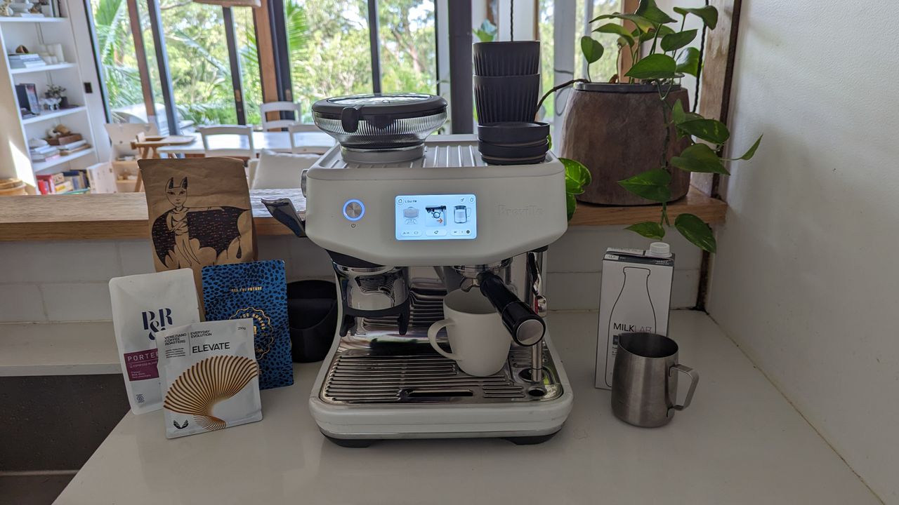 The Barista Touch Impress in various stages of use
