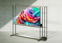 A transparent TV. It is on a white background. On the screen is an abstract colourful pattern.