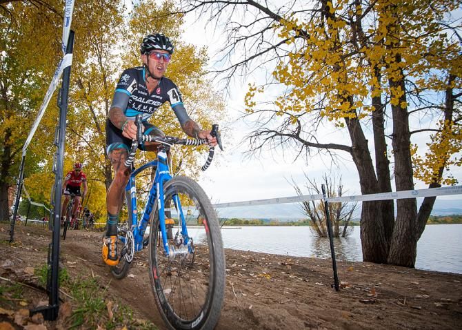 Berden (Raleigh Clement) along the waterfront and golden aspen leaves. Colorado Cross Classic.