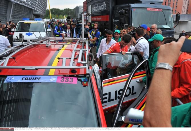 Greg Henderson gets into the Lotto-Belisol car after his crash