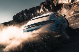Lamborghini Urus S driving away and throwing up dust