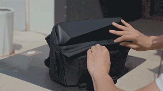 A person using the MagGo X in different situations, for example for storing and accessing camera gear