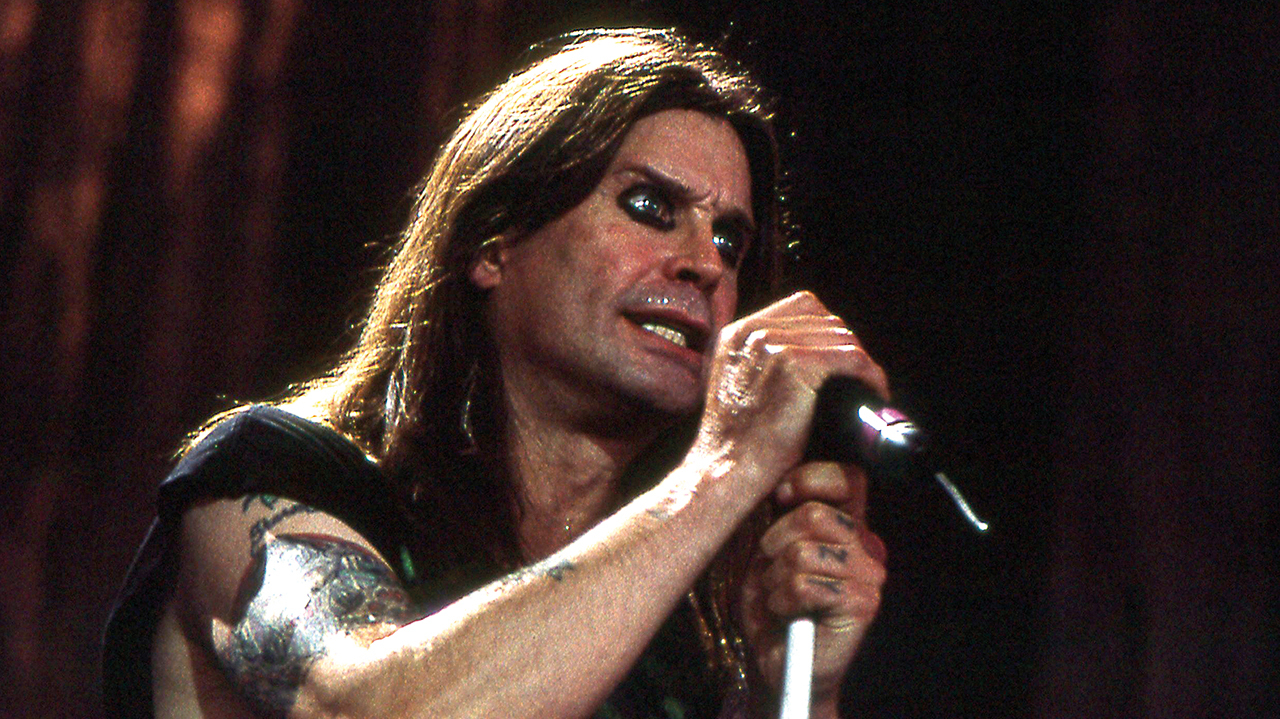 A photograph of Ozzy Osbourne on stage at Ozzfest in the 90s