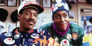 Eddie Murphy and Arsenio Hall decked out in new York stuff in Coming To America