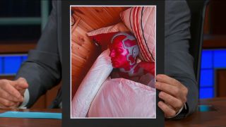 Vision relaxing in a bed on The Late Show with Stephen Colbert
