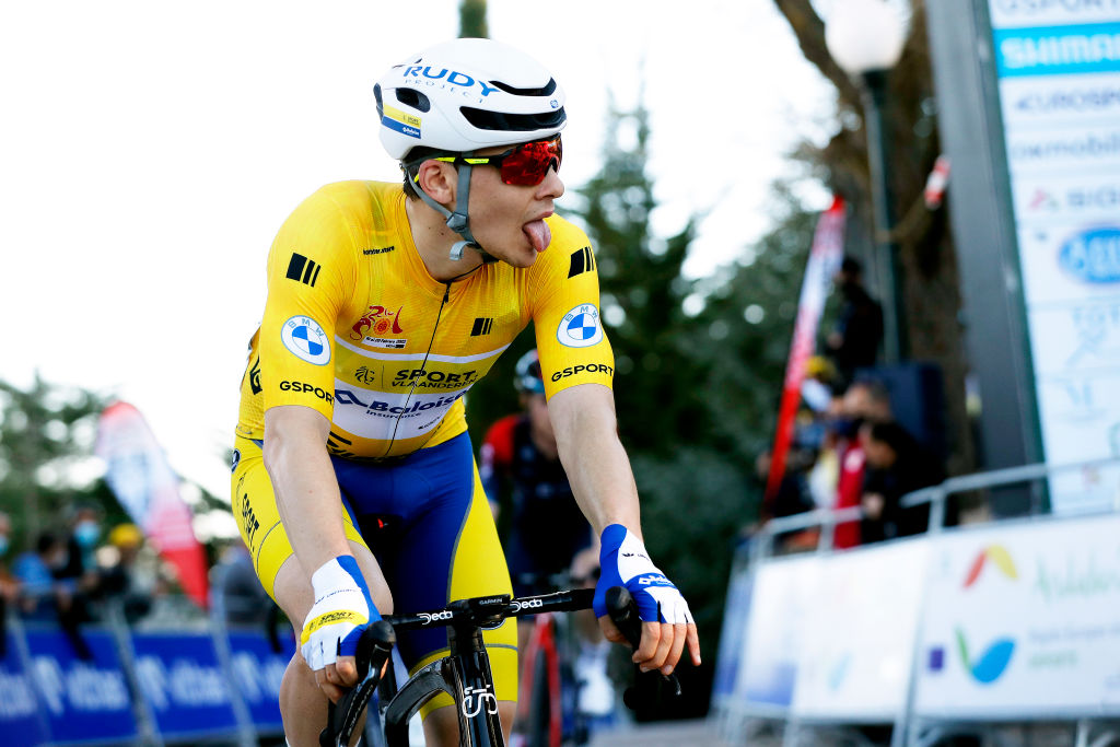 ALCALA LA REAL SPAIN FEBRUARY 17 Rune Herregodts of Belgium and Team Sport Vlaanderen Baloise Yellow Leader Jersey crosses the finishing line during the 68th Vuelta A Andalucia Ruta Del Sol 2022 Stage 2 a 1506km stage from Archidona to Alcal La Real 982m 68RdS on February 17 2022 in Alcala la Real Spain Photo by Bas CzerwinskiGetty Images
