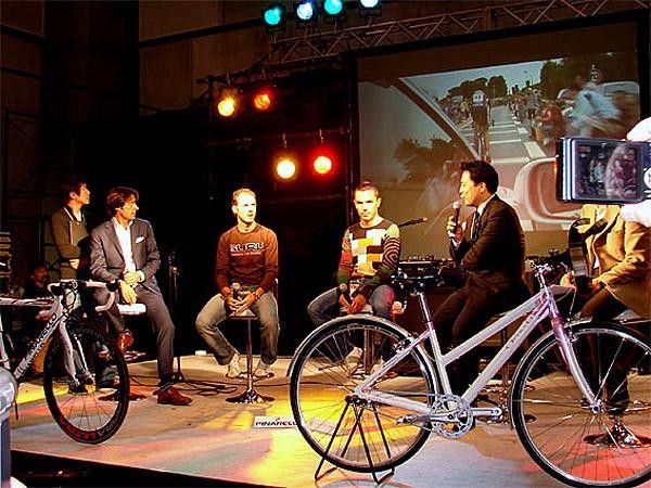 President Fausto Pinarello, Alejandro Valverde, and Joaquin Rodriguez participate in the on-stage show.