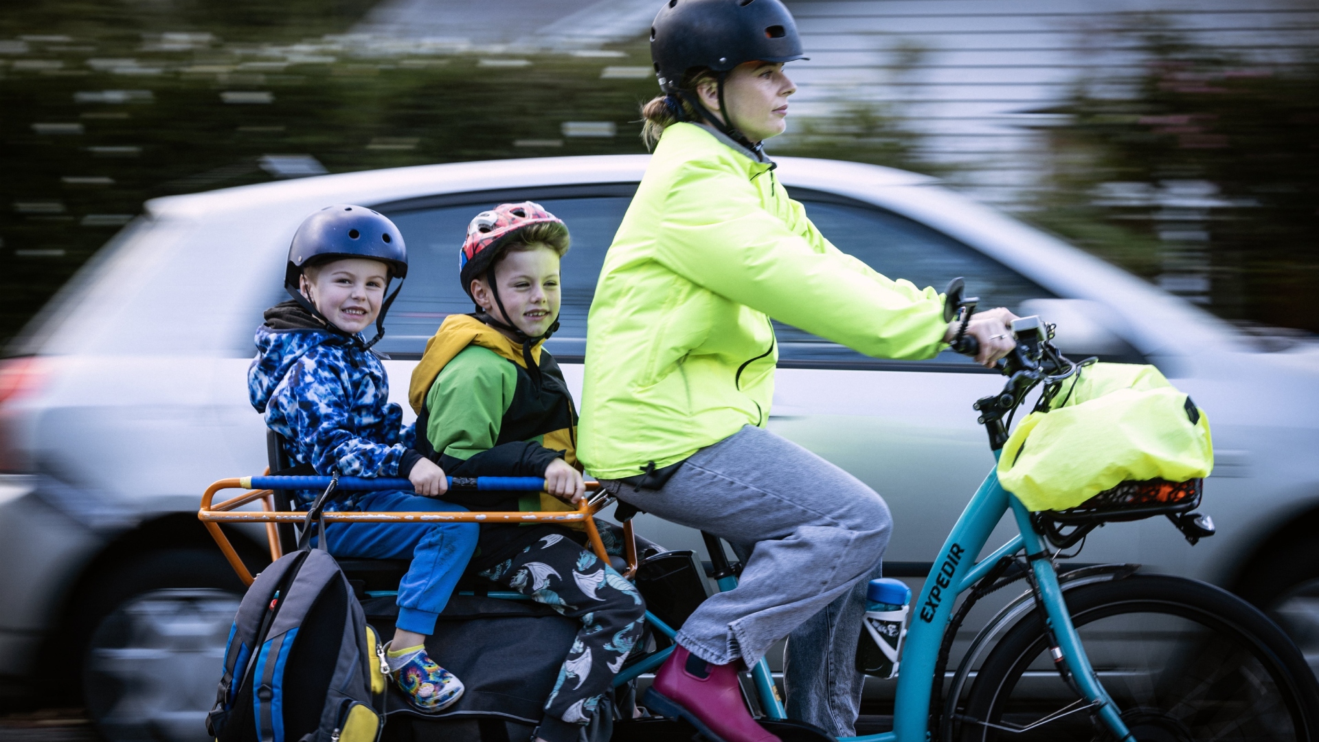 parents and children on e-bikes