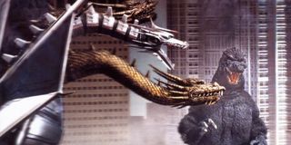 Godzilla vs King Ghidorah MechaGhidorah comes in to attack Godzilla in the city