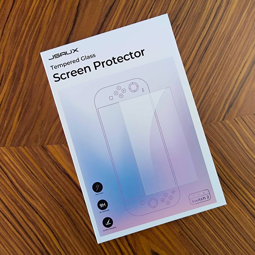 Jsaux screen protector pack for Switch 2 on woodgrain table.