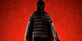 Brightburn in his full costume and hood