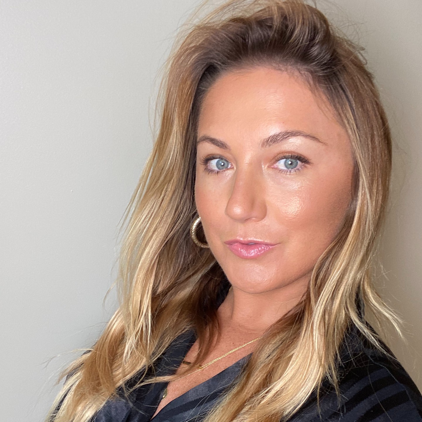 Headshot of Tobi Henney