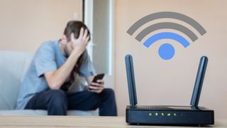 Un hombre frustrado mirando su teléfono con un router inalámbrico en primer plano