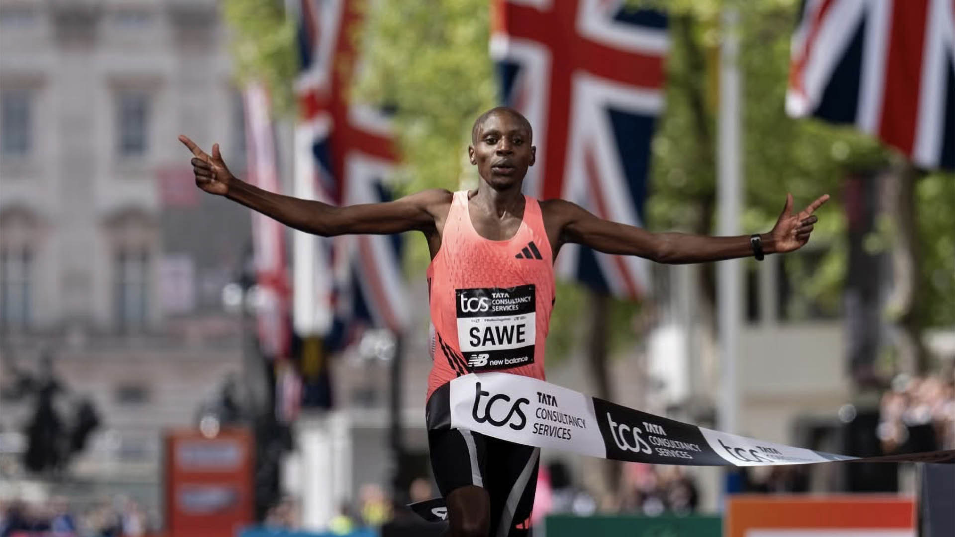 A photo of Sawe winning the London Marathon. 