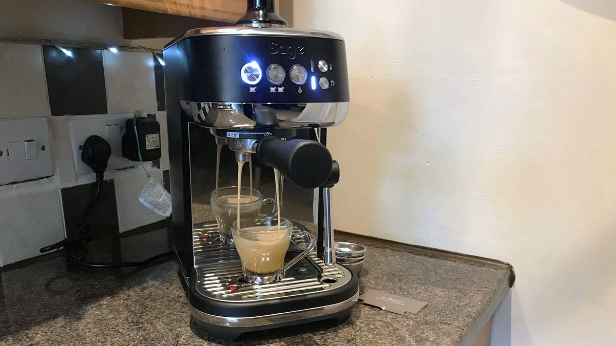 Breville Bambino Plus coffee maker on kitchen counter