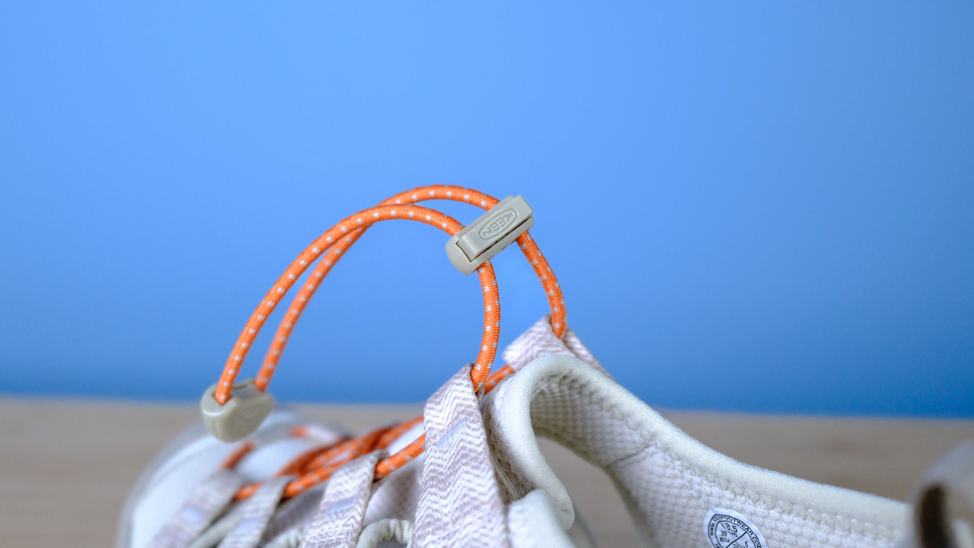 The Keen Hyperport H2 water hiking sandals with aquagrip soles, injected foam soles, and a cinch clasp for slip-on ease, in the taupe/coral colorway