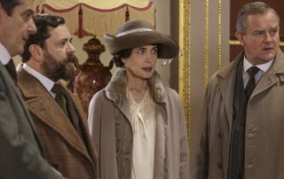 Robert and Cora, Lord and Lady Grantham, at the auction at Mallerton