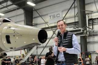 Whitesides Speaks in Hangar Housing Second Spaceshiptwo