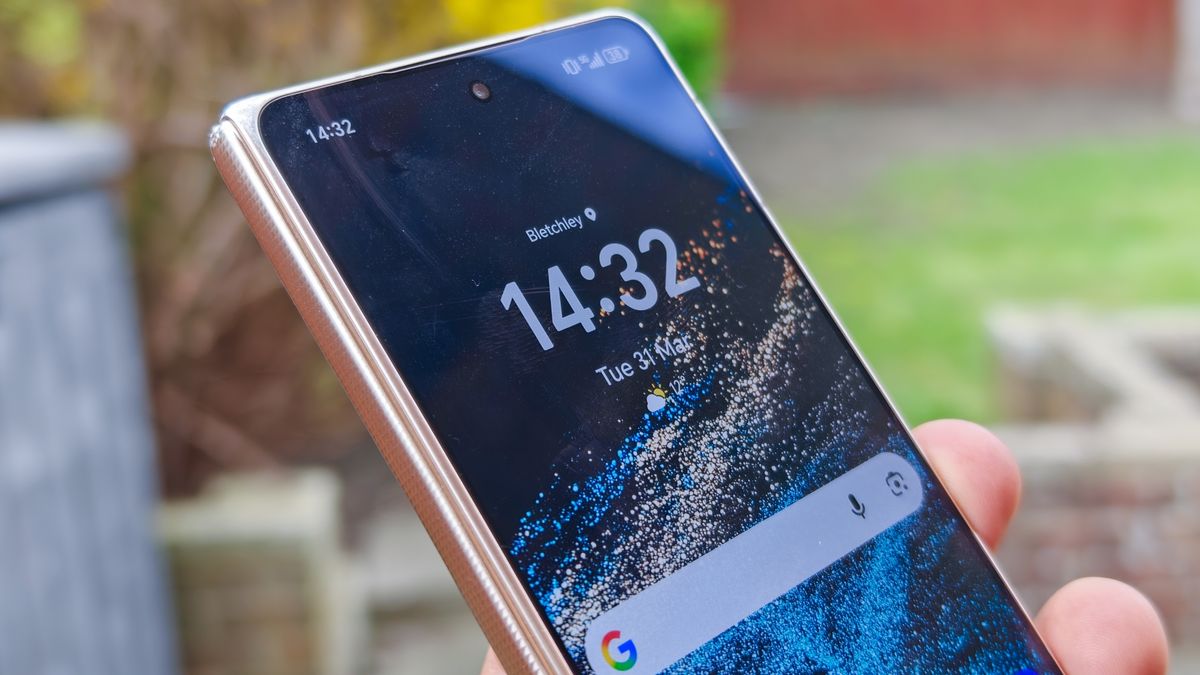 The Honor Magic V6 in gold after being put through a washing machine, complete with scratches and blemishes but fully working.