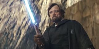 Luke with his lightsaber in Star Wars The Last Jedi