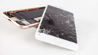 A person repairing an iPhone