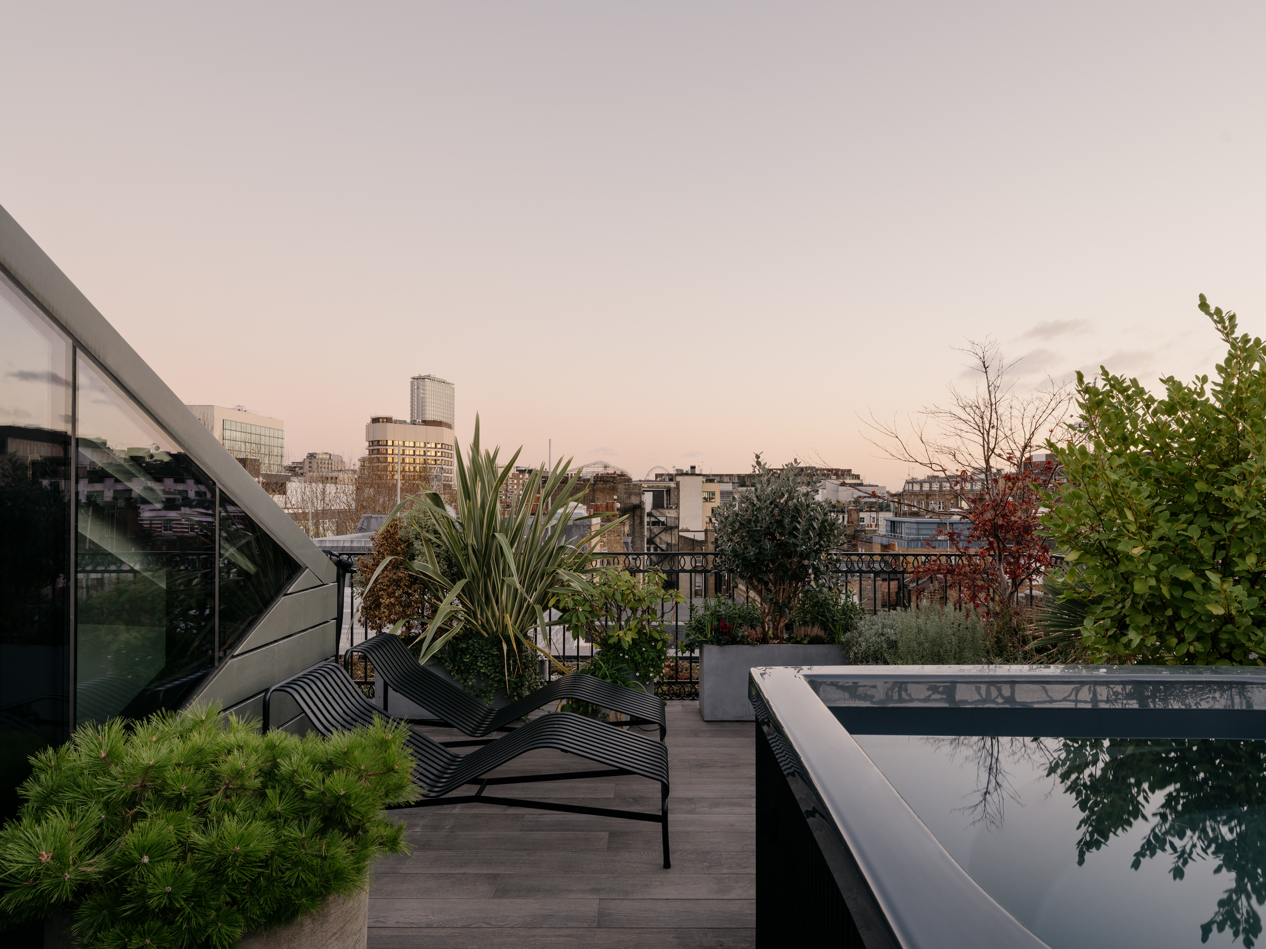 The fifth floor terrace includes a hot tub with skyline views