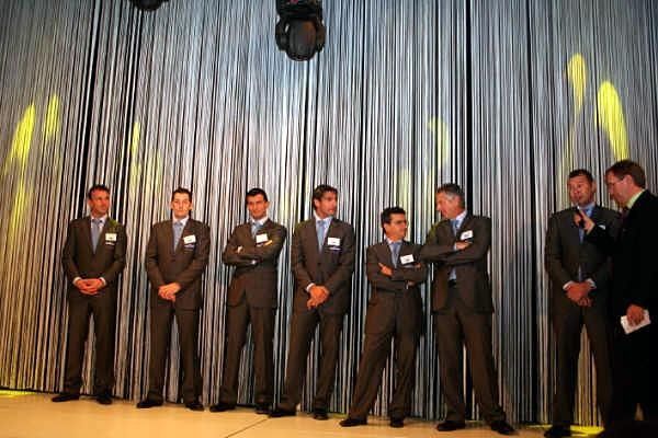 The team leaders gather