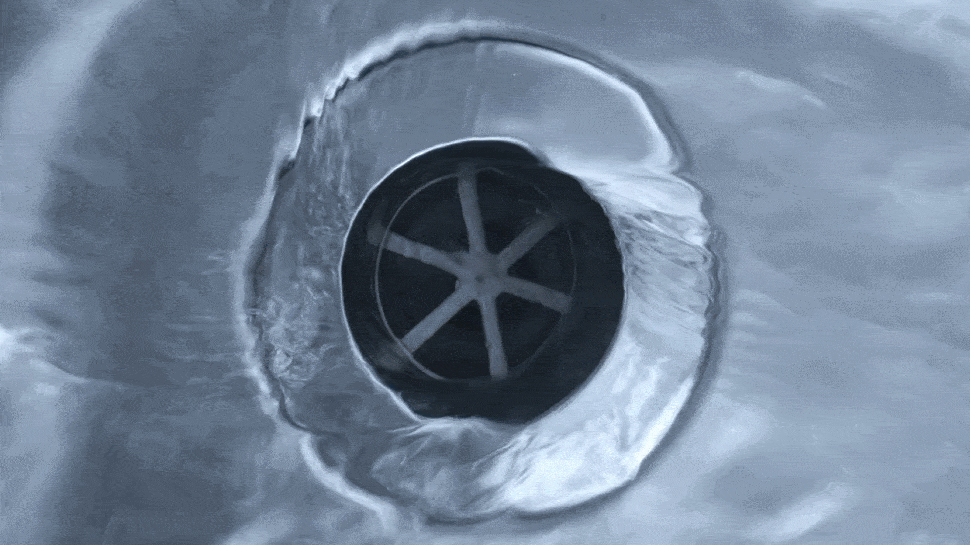 Does water drain in different directions in the Northern and Southern hemispheres?