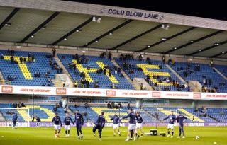 Millwall fans applauded both sets of players in their stance against racism prior to kick off at The Den