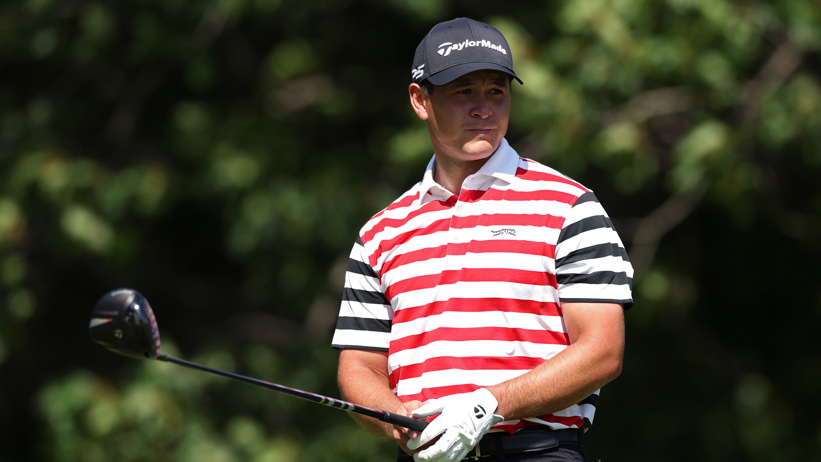 Karl Vilips lines up a tee shot