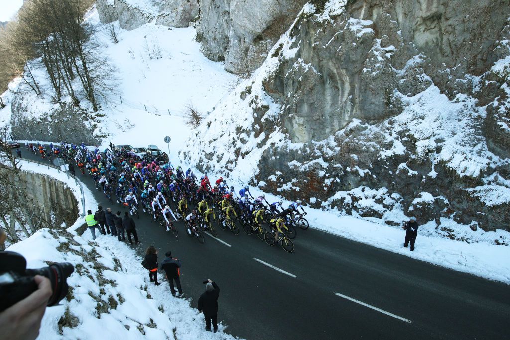 VIANA SPAIN APRIL 05 A general view of the Peloton passing through a snowy landscape during the 61st Itzulia Basque Country 2022 Stage 2 a 2076km stage from Leitza to Viana 461m itzulia WorldTour on April 05 2022 in Viana Spain Photo by Gonzalo Arroyo MorenoGetty Images