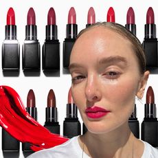 hannah baxter wearing pink lipstick against a black and white background of lipstick bullets