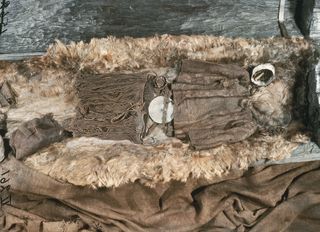 A reconstruction of the tomb of the Egtved Girl, which was discovered in Denmark in 1921.
