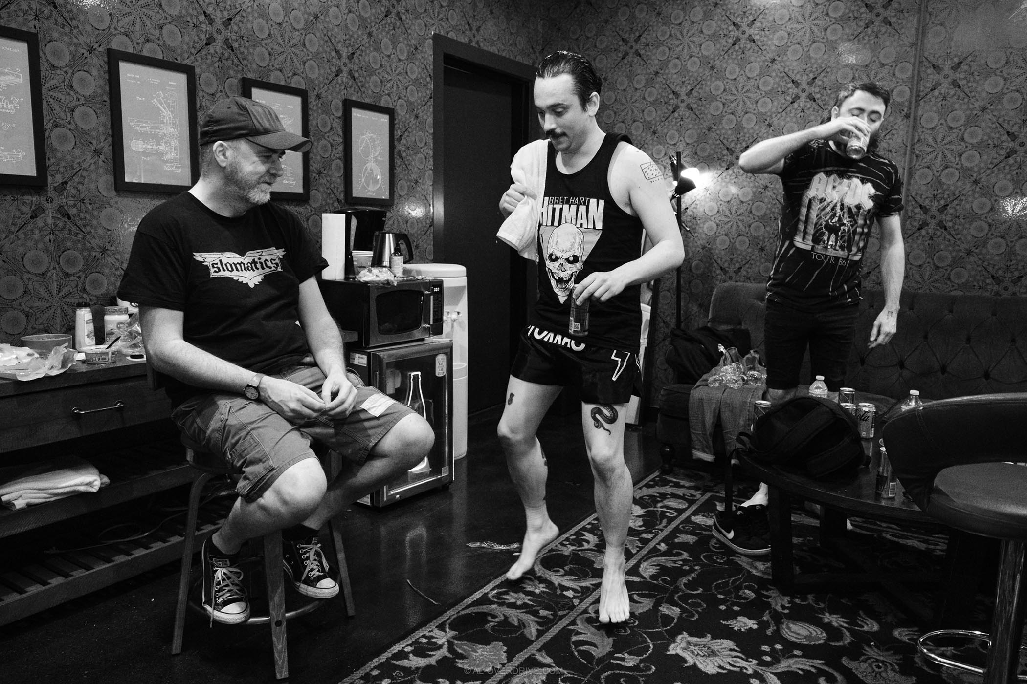 Pigs Pigs Pigs Pigs Pigs Pigs Pigs&#039; frontman Matt Baty warms up backstage before a show