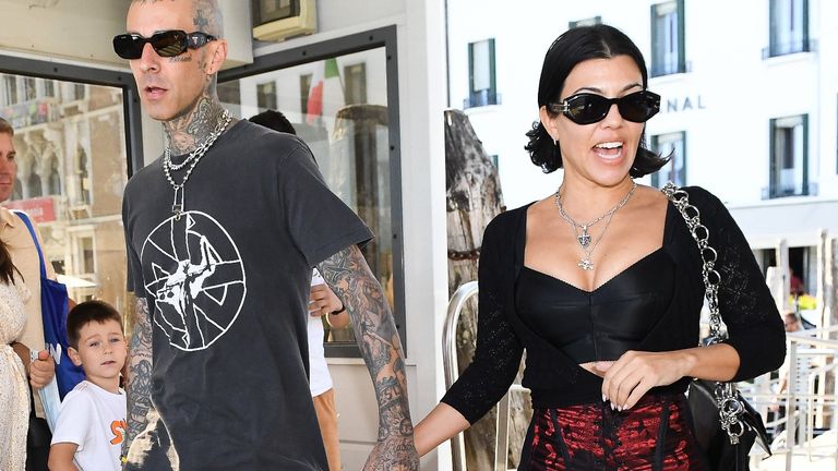 Kourtney Kardashian and Travis Barker are seen on August 29, 2021 in Venice, Italy