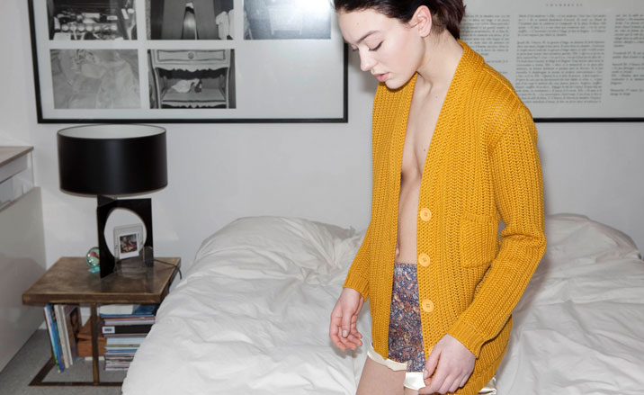 Woman wearing yellow knitted cardigan