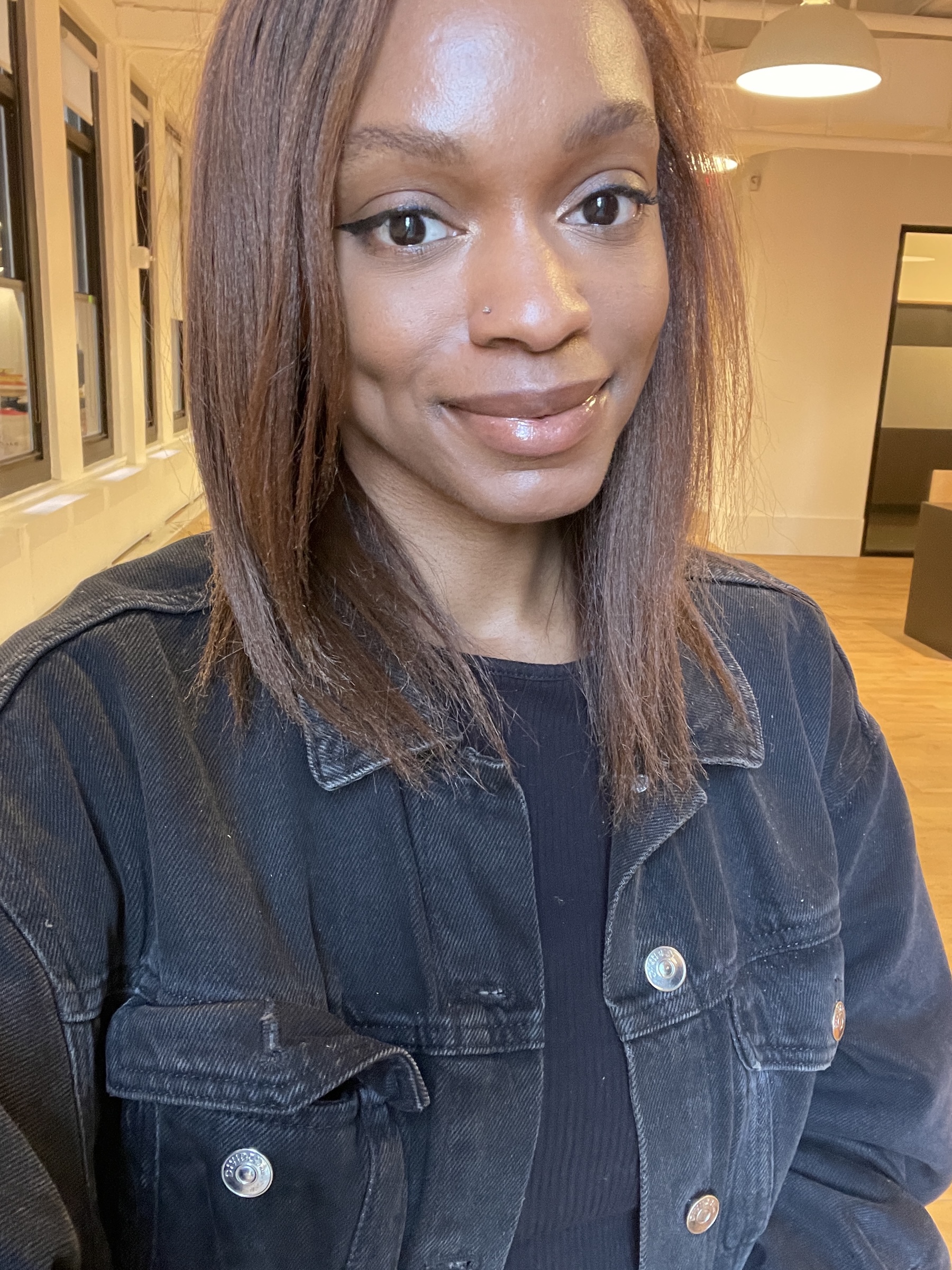 a selfie of a person with brown hair