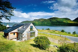 A charming stone barn conversion on a breathtaking loch-side site in the Highlands