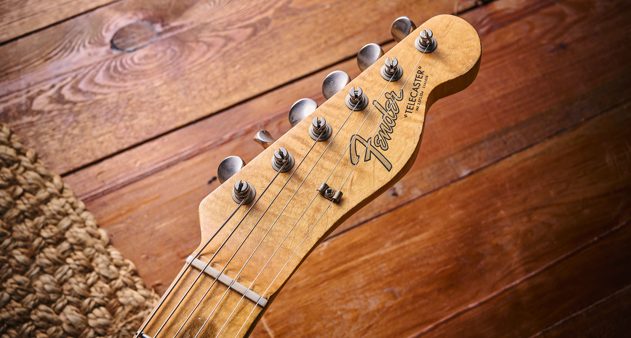 The headstock of a 1967 Fender Telecaster in Ocean Turquoise