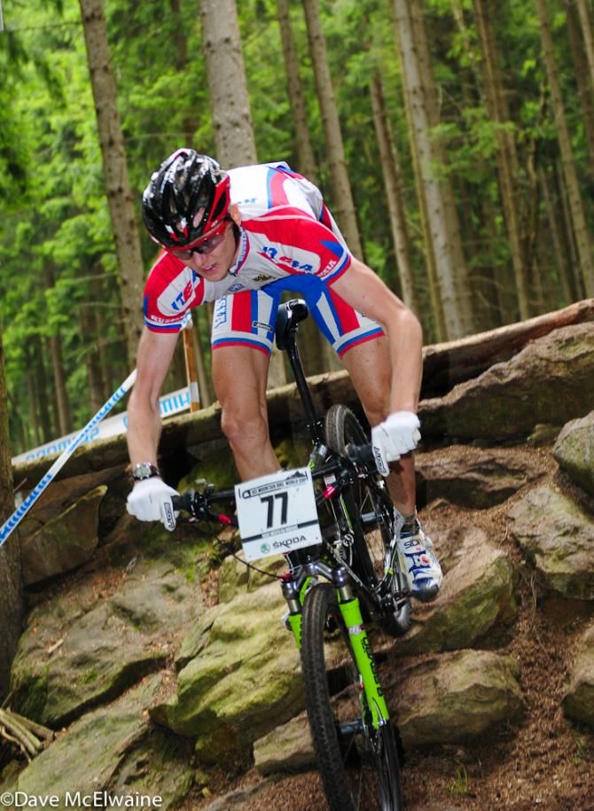 Roman Sessler (Israel) deals with some slippery moss on the rocks