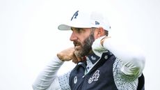 Dustin Johnson sorts out his collar during the 2025 Alfred Dunhill Links Championship