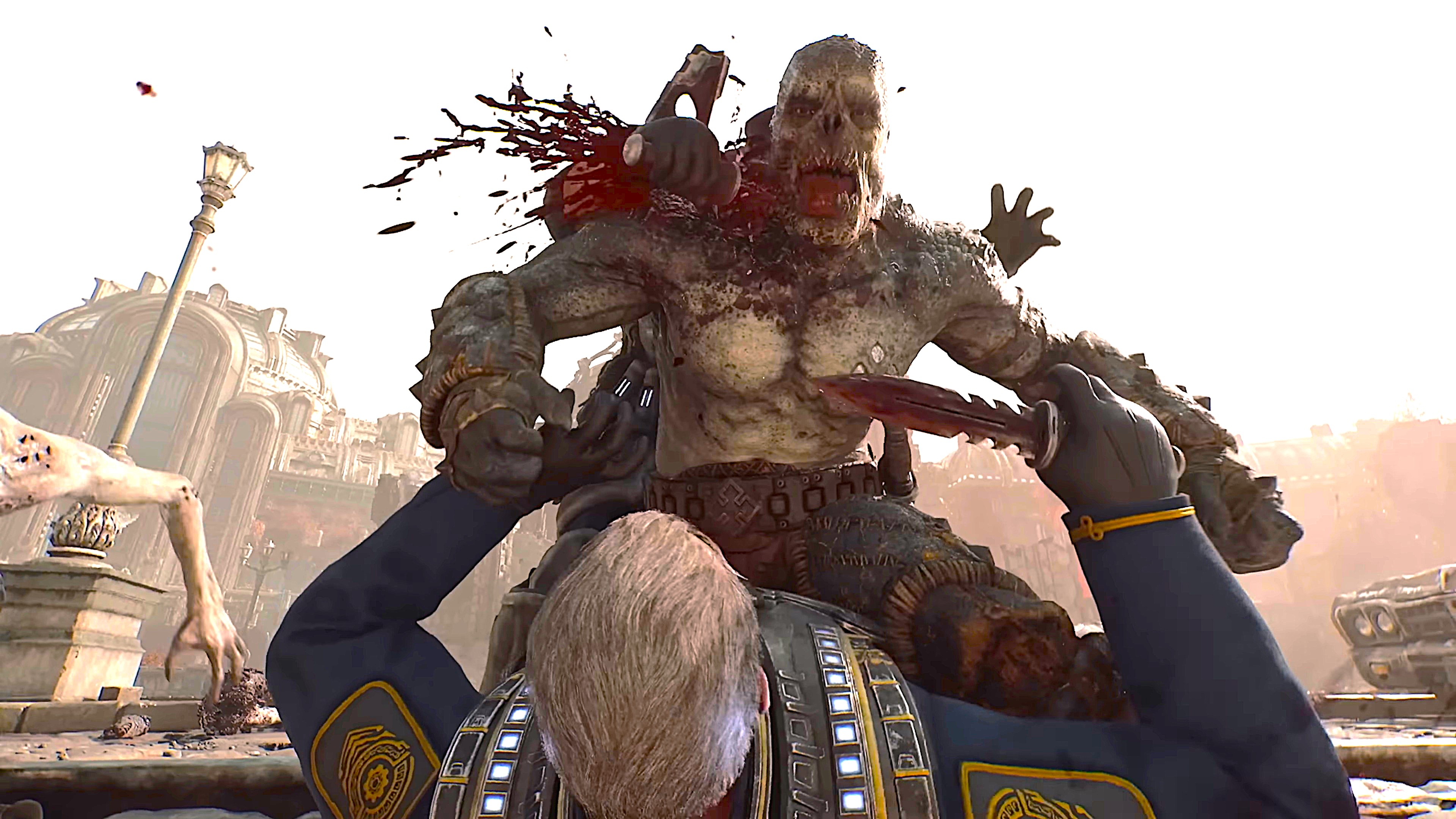 A soldier in blue armor stabs a monstrous, grey-skinned creature in the chest with a combat knife, causing a violent spray of blood in a city ruin.