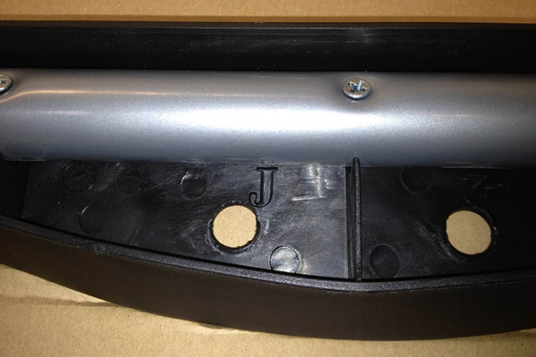 "J" is stamped on the underside of the tool holder