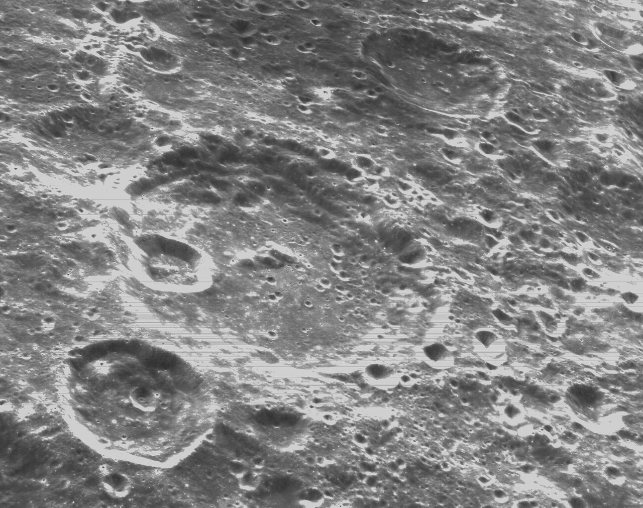 Close-up view of the lunar surface captured by the Orion spacecraft's onboard optical navigation camera during the mission's closest approach to the lunar surface on Nov. 21, 2022.